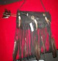 Black leather quiver with deer bone knive